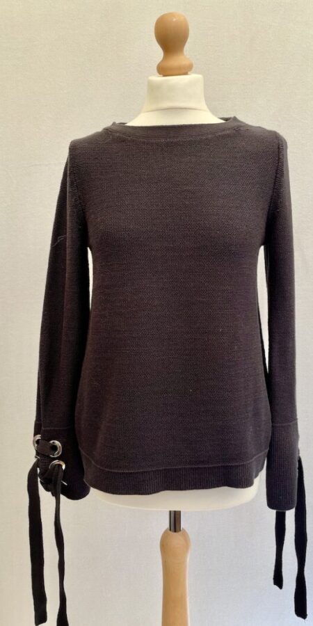 nn Taylor navy blue chunky knit jumper with metal loop holes and ribbon ties at the wrists. Fabric