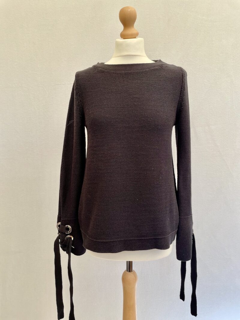 nn Taylor navy blue chunky knit jumper with metal loop holes and ribbon ties at the wrists. Fabric