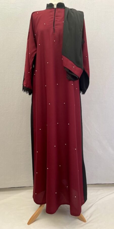 Buy this modest simple cut abaya with a burgundy coloured front that has little tiny pearls sewn across it