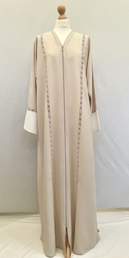 Beige abaya with cream section at wrist