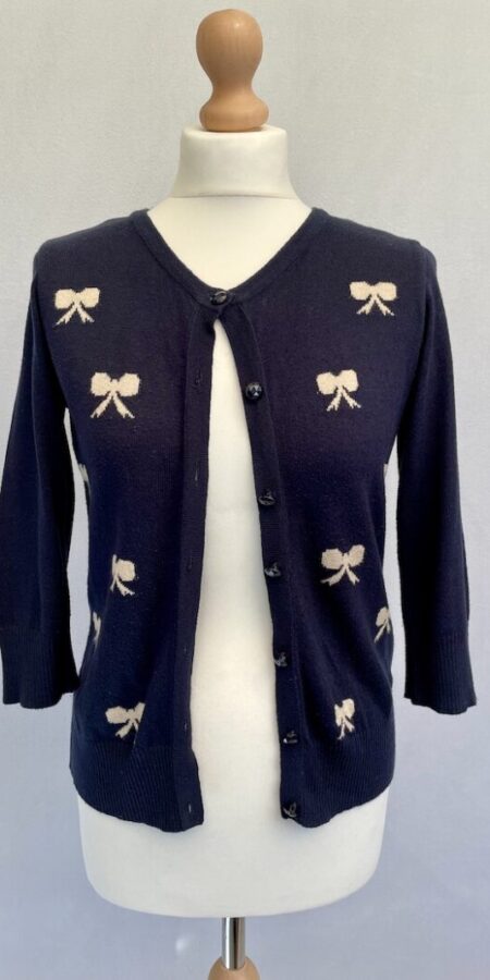 Dorothy Perkins navy knit cardigan with beige bow patterns