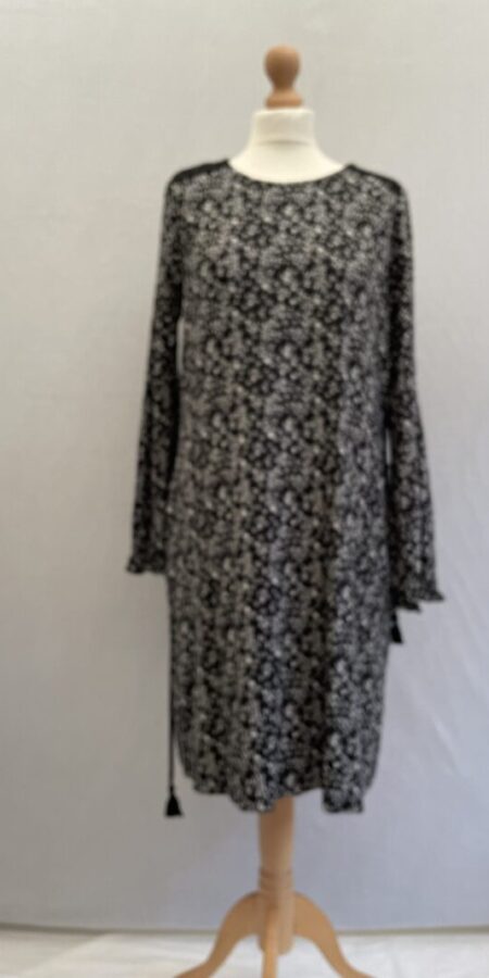 comfortable floral black and white knee length modest dress in soft stretch jersey with fabric tie belt and long sleeves