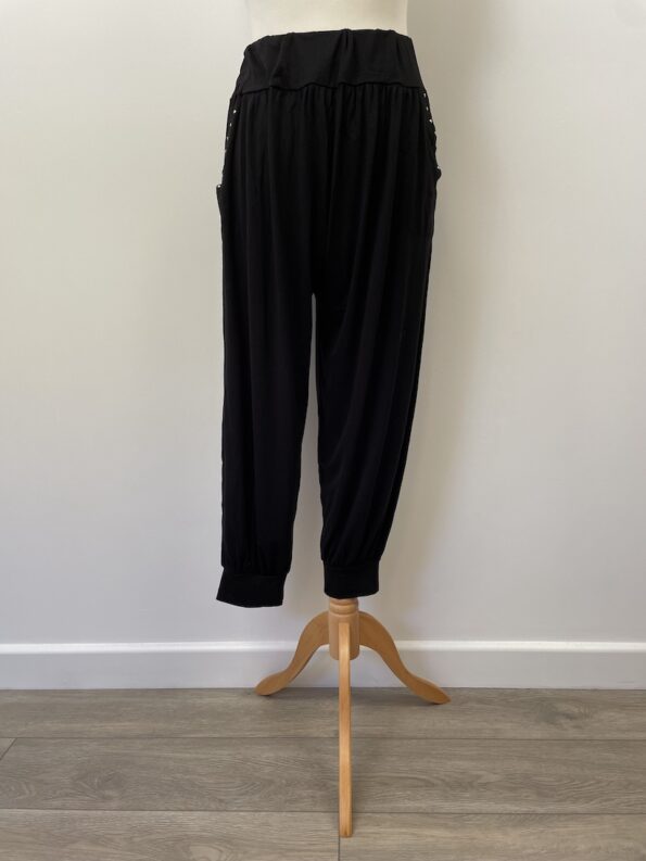 Black harem pants, new without tag, two pockets with sequins, fits size 8-12