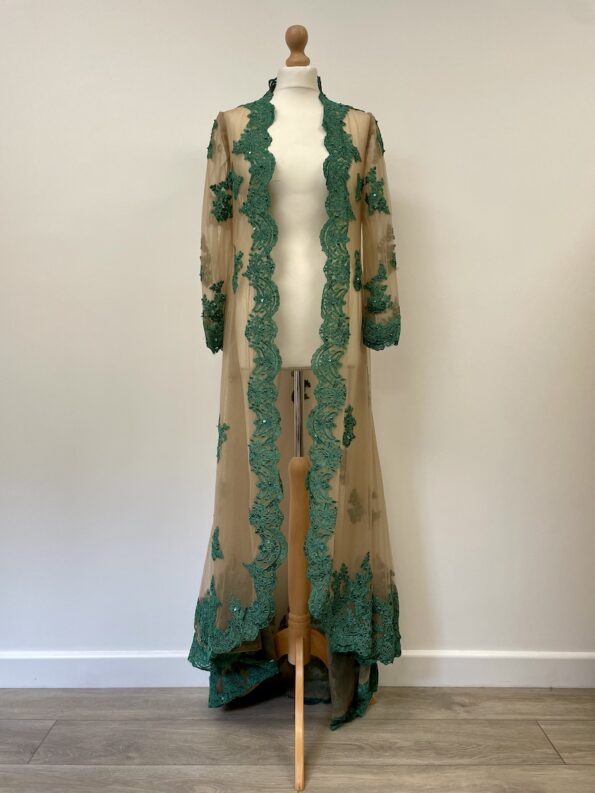 Gold net overjacket with green applique embroidery