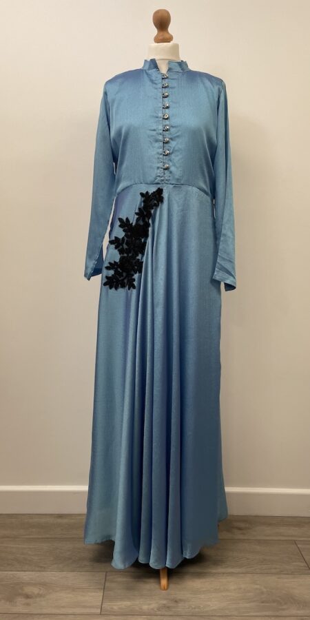 Light blue crepe-like dress with long sleeves, approx. size 16