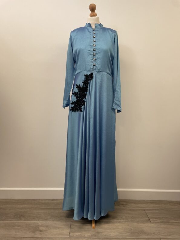 Light blue crepe-like dress with long sleeves, approx. size 16