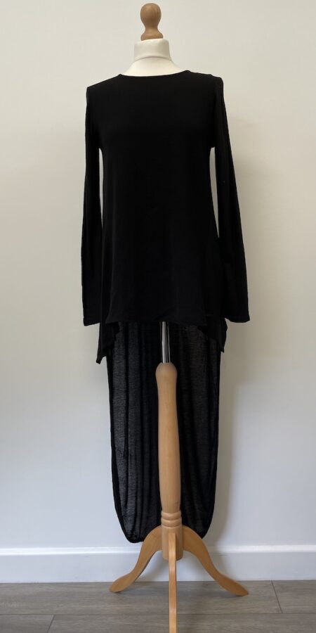 Zara black top with a long length back and a short front.