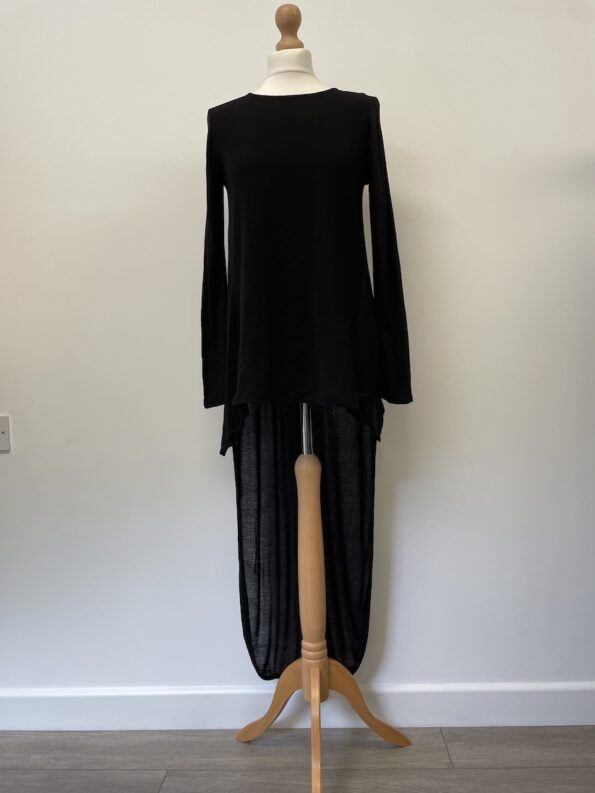 Zara black top with a long length back and a short front.