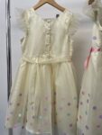 2x Jona Michelle matching girls yellow spots party dresses – full view