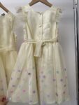 2x Jona Michelle matching girls yellow spots party dresses – full view