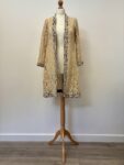 Hand Stitched/tailored beige lace with brown trim open front jacket, fits size 10-12