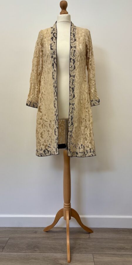 Hand Stitched/tailored beige lace with brown trim open front jacket, fits size 10-12