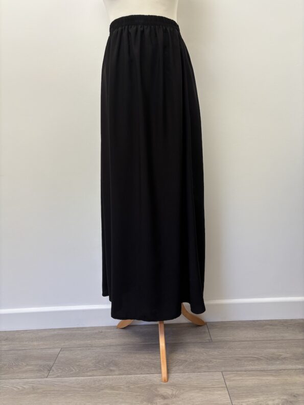 Long black plain maxi skirt with elastic waist, size 10